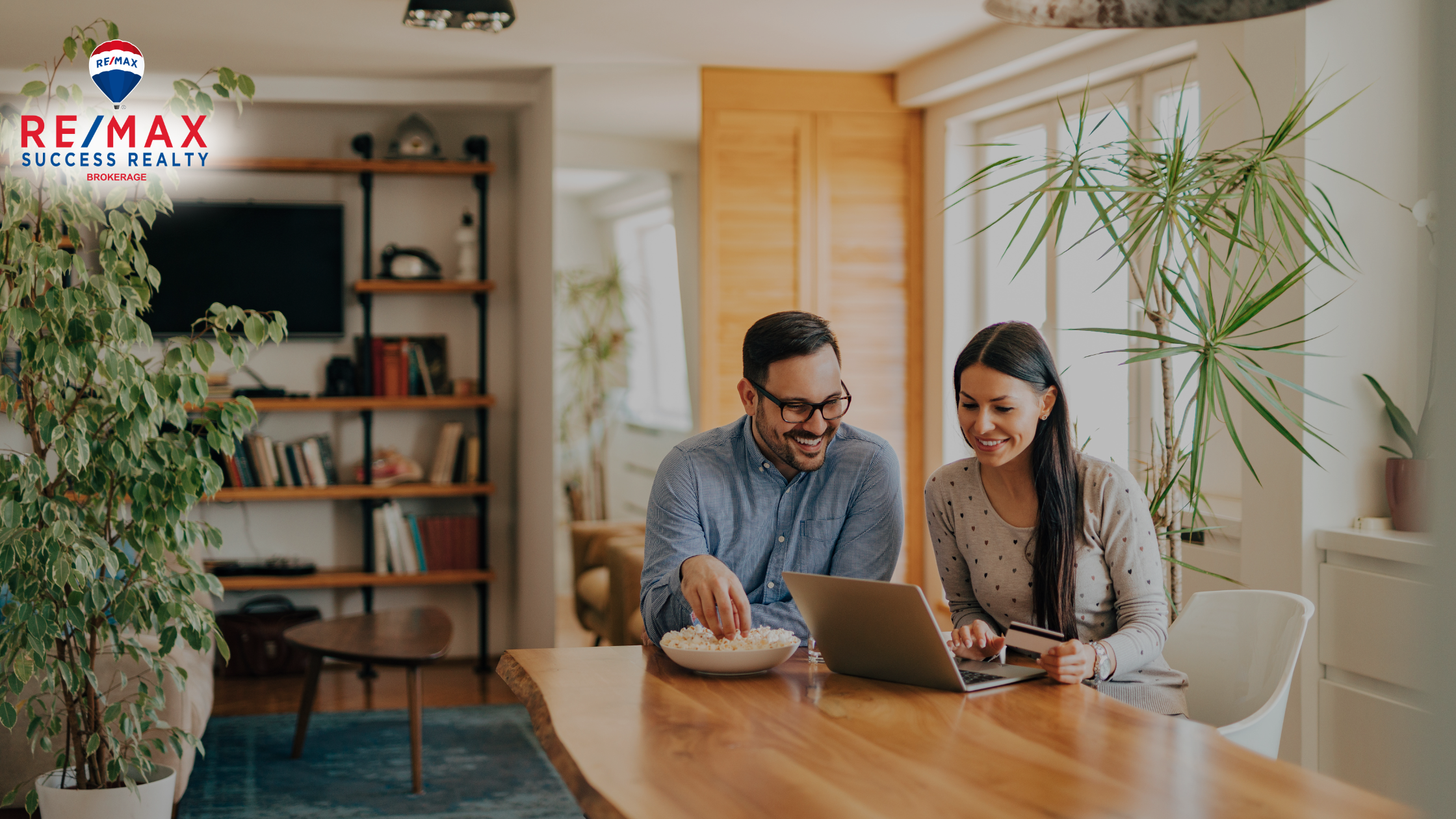 home buyers sitting in their new home